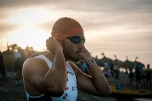 Salida natación triatlón aguas abiertas playa de Can Pere Antoni Palma Mallorca amanecer.